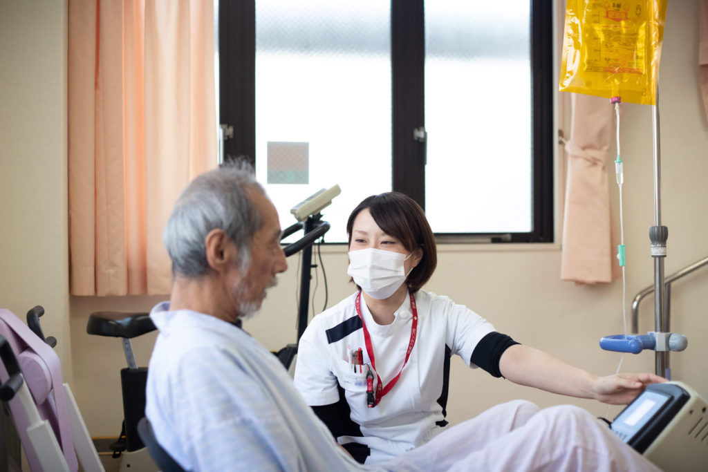 療法士と患者のリハビリテーション