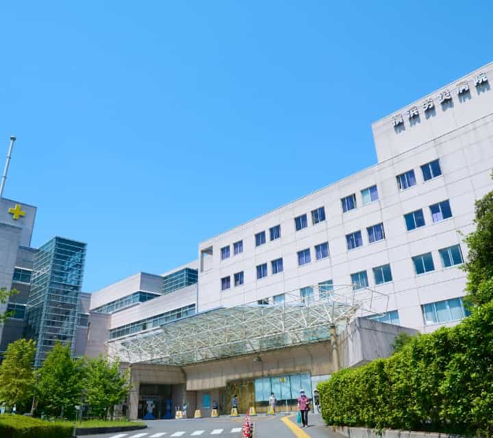 公式トップ「地域医療連携」に掲載された病院正面玄関と建物